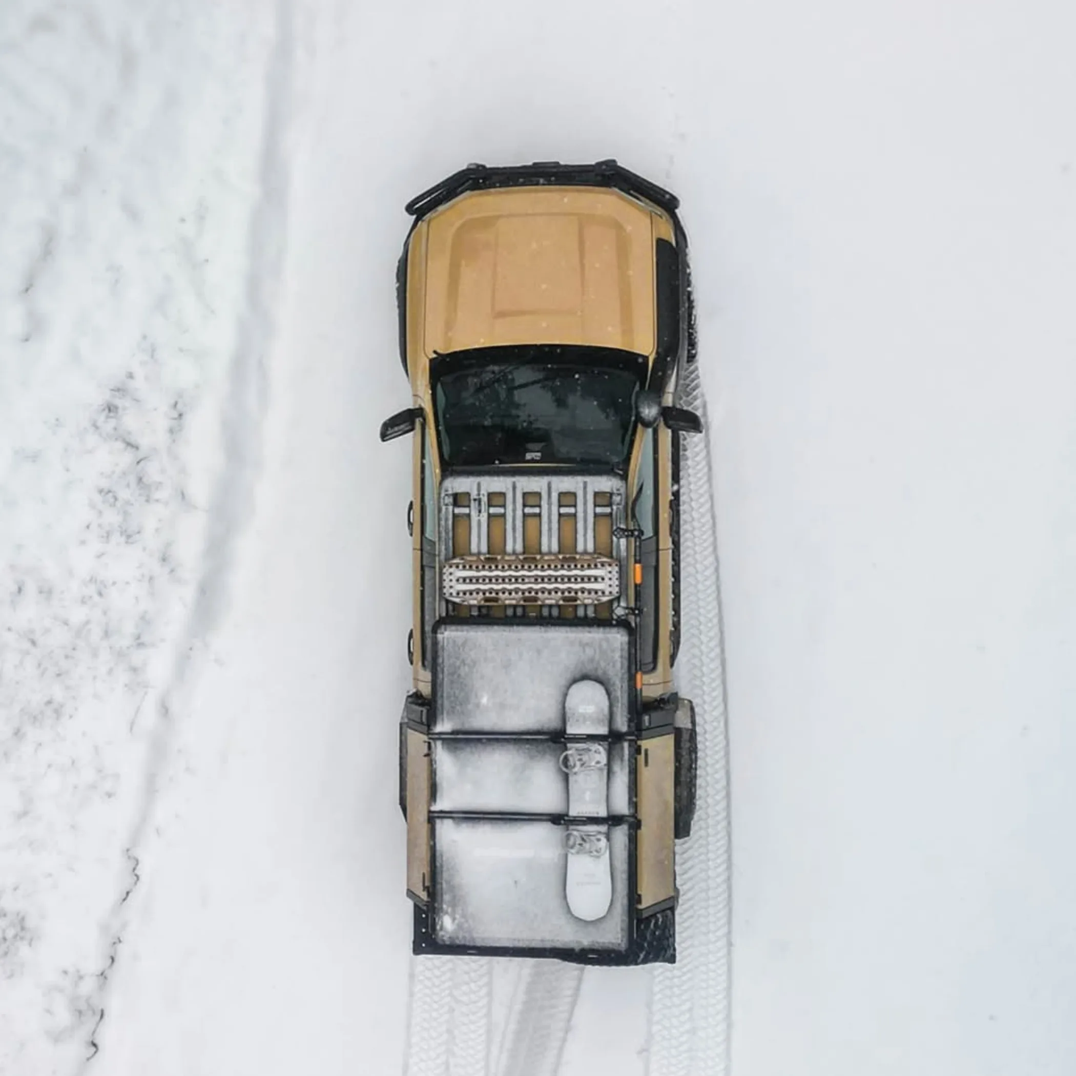 4x4 vehicle driving in snow