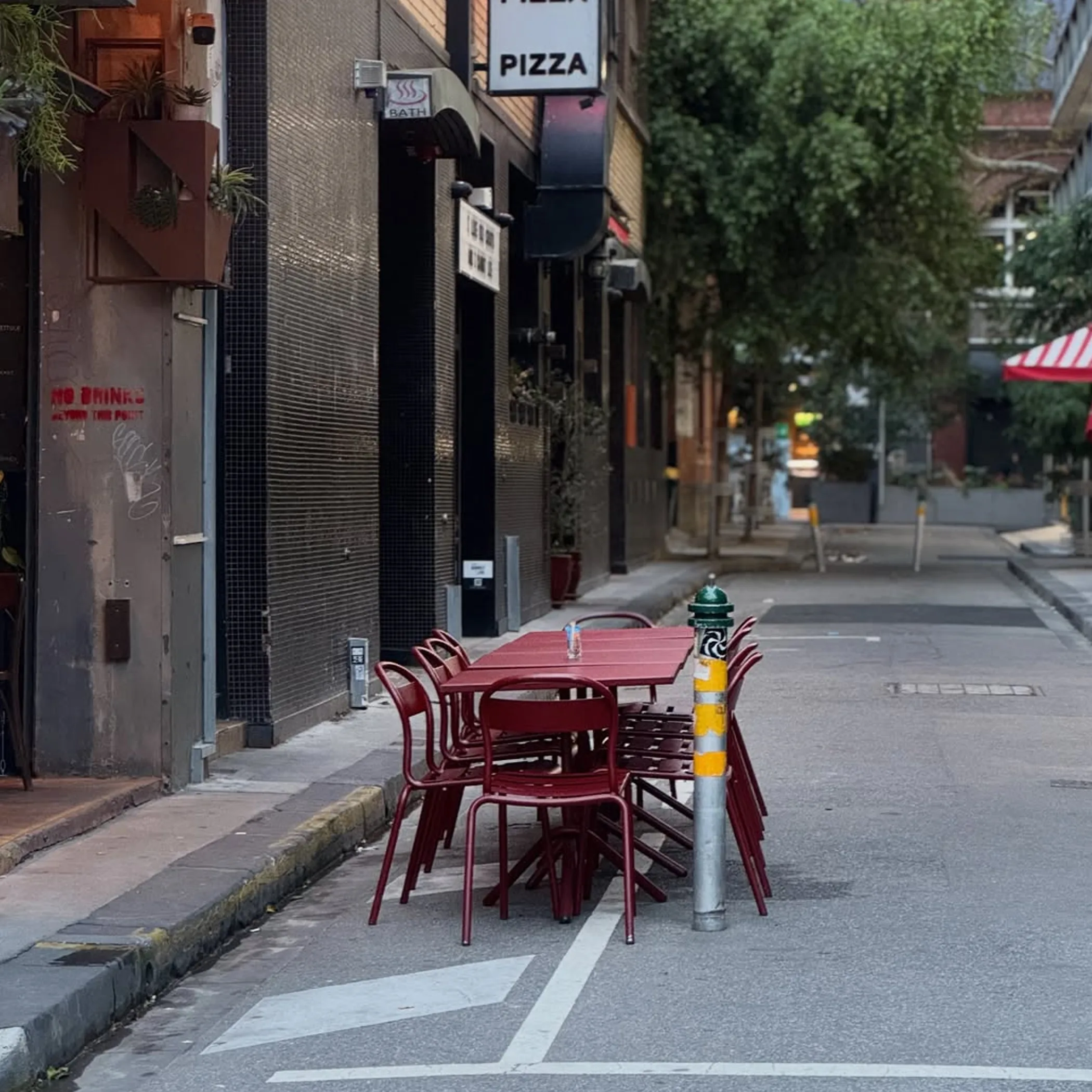 urban laneway dining scene at night